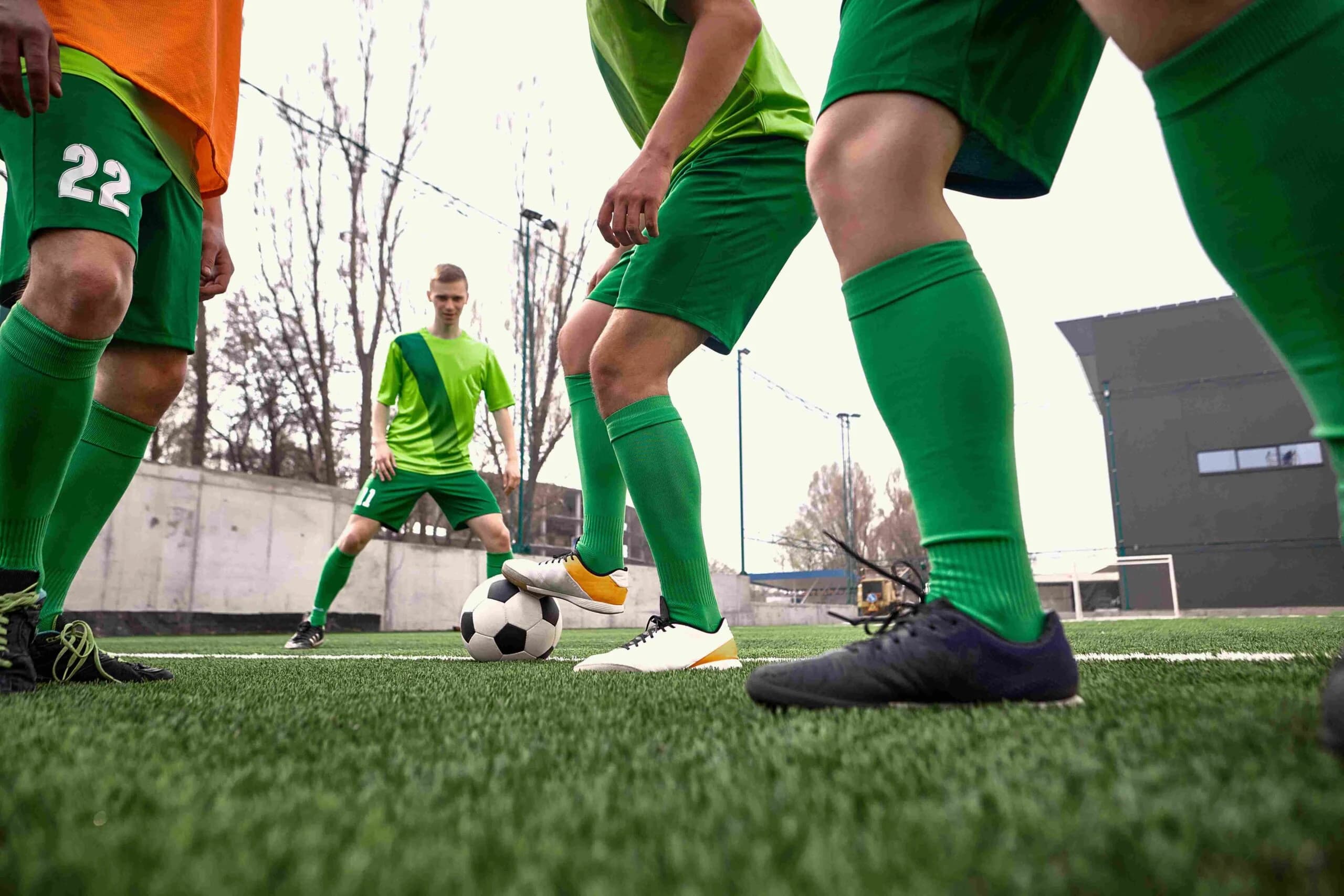 Soccer players training on field